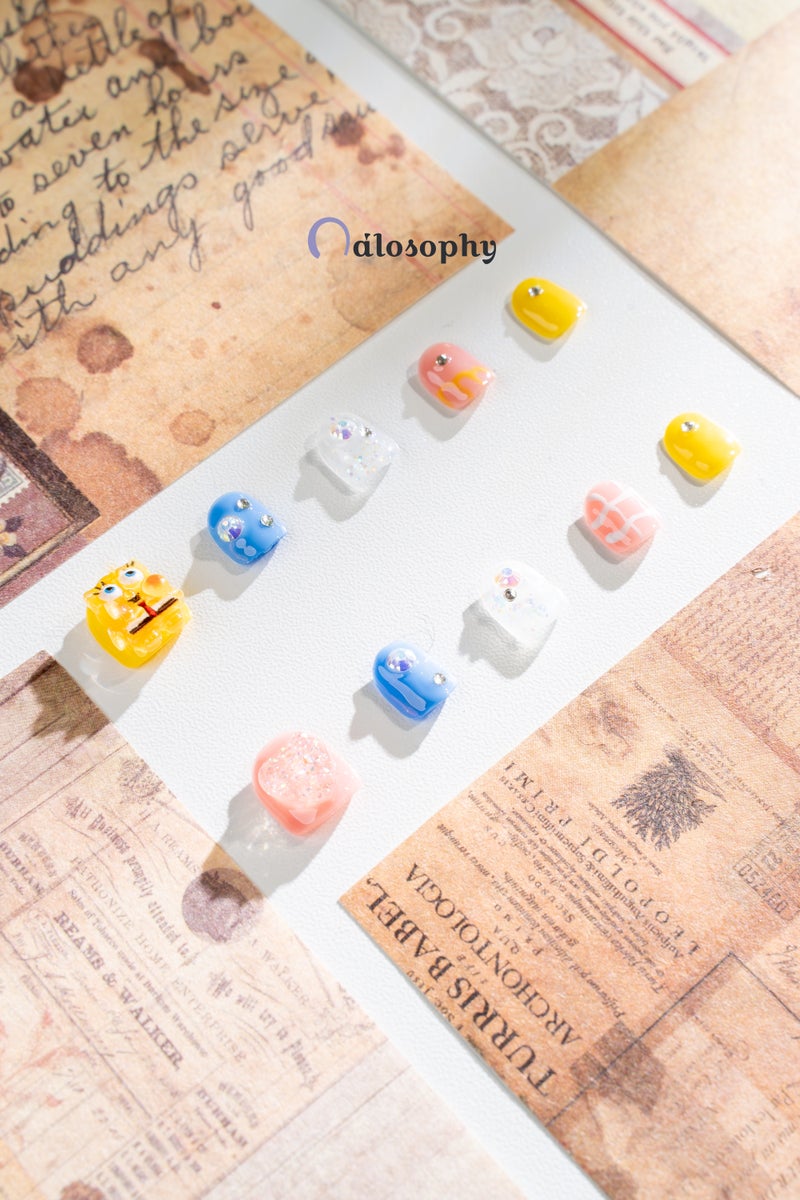 Nailosophy أظافر أطفال مصنوعة يدويًا من الجل قابلة للضغط بشكل لطيف باللون الأصفر مع إسفنج وقلوب | شكل صغير - Image 3
